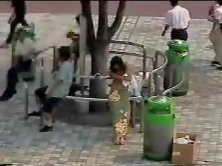 Changing in the street - Japanese daughter in public first part